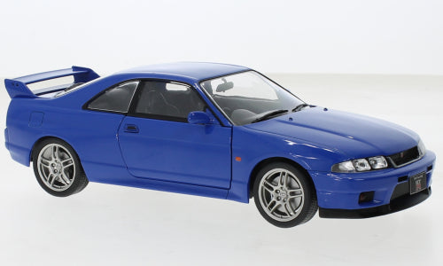 1:24 Nissan Skyline GT-R R33, blå, højrestyret, Whitebox, delvis åben model